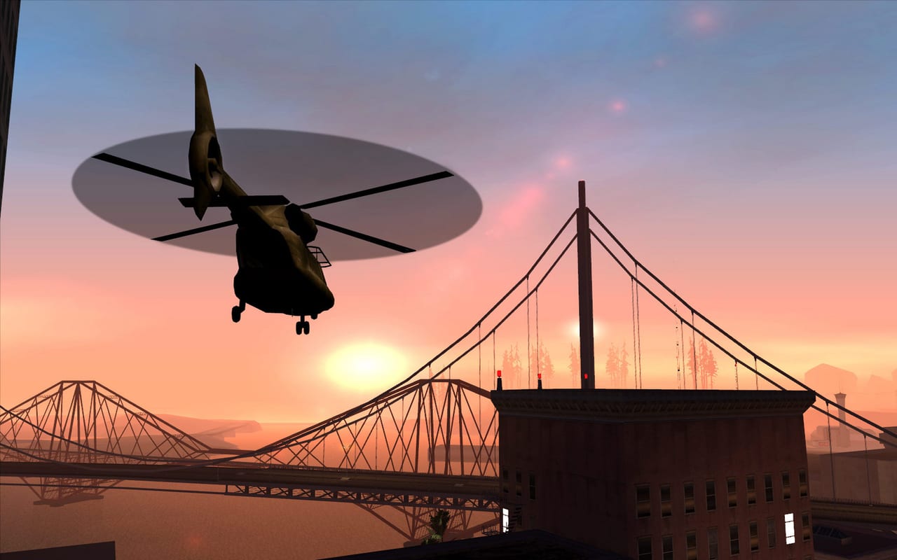 Grand Theft Auto San Andreas helicopter flying over a sunset bridge in the classic open world